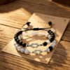 1-pair-of-concentric-knots-white-pine-black-frosted-bracelet-silver-fittings
